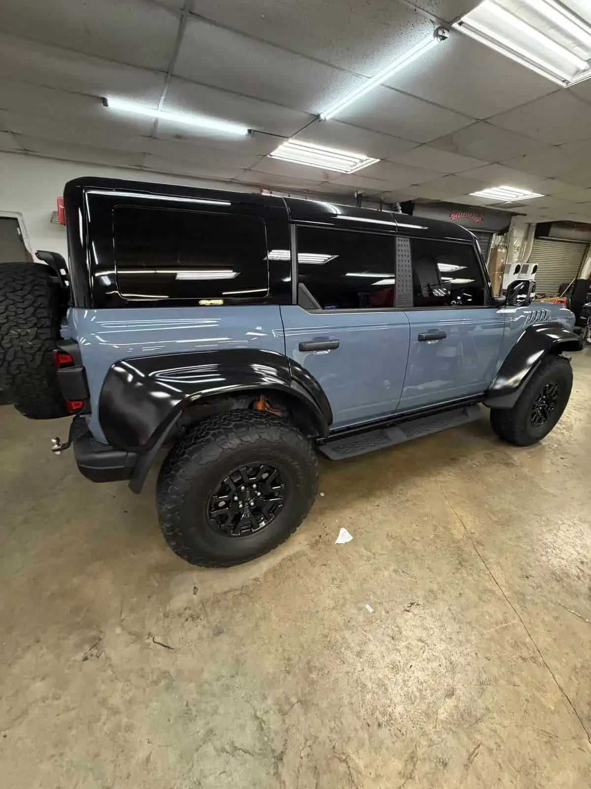 blue bronco in bay