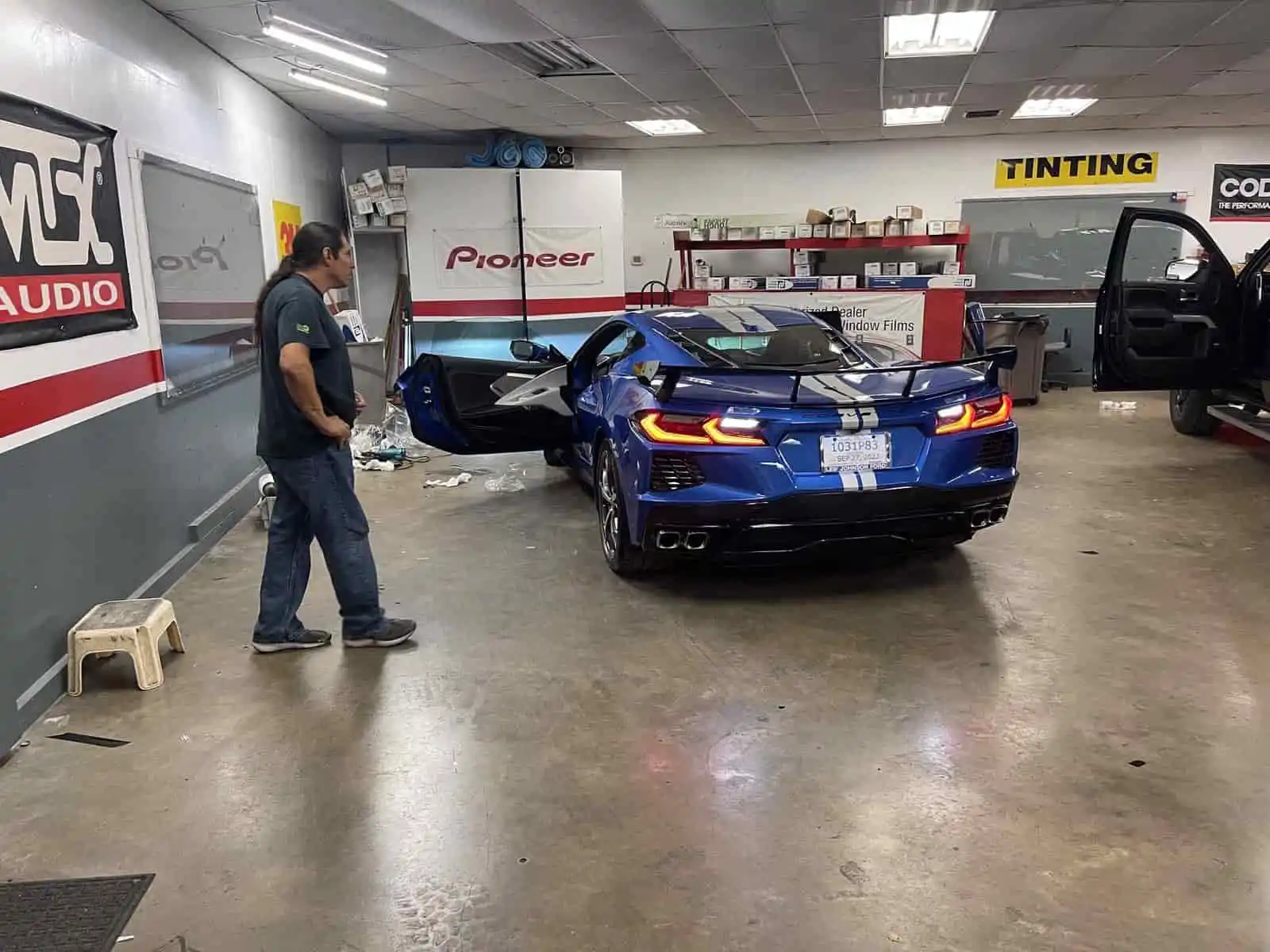 blue corvette in bay