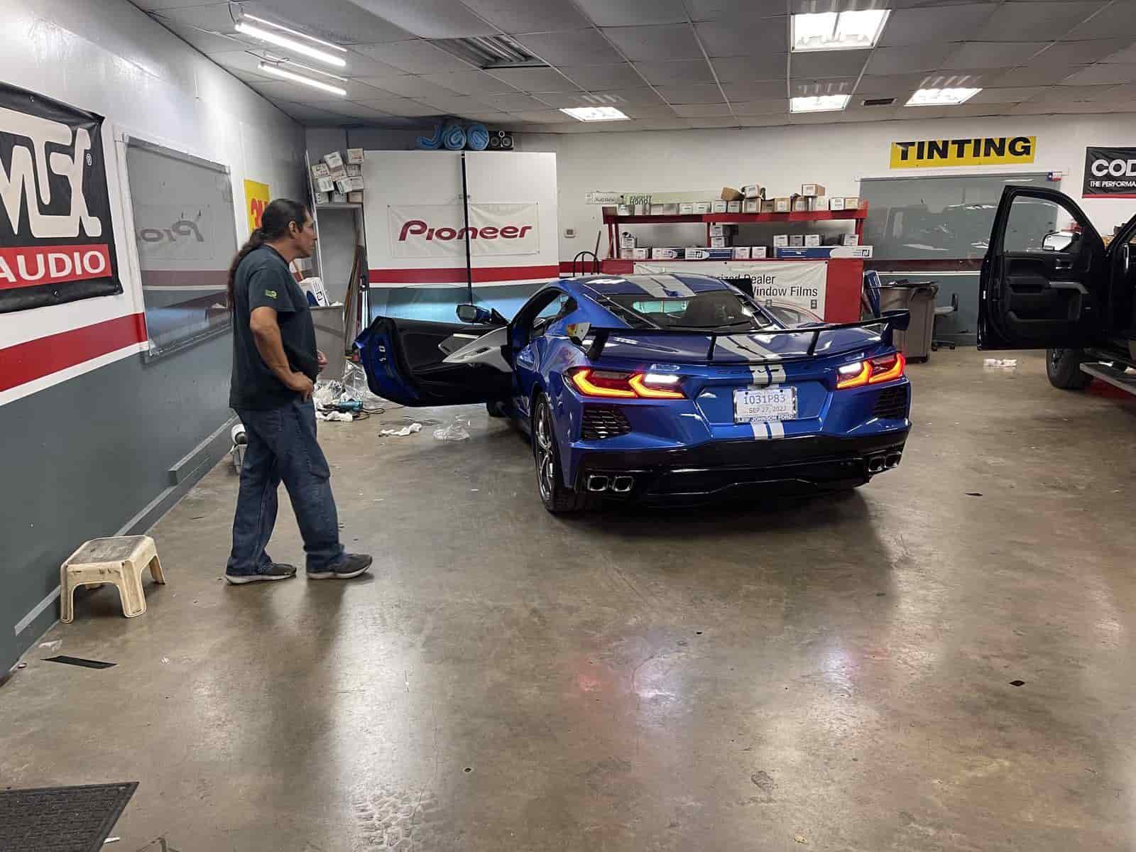 blue corvette in bay