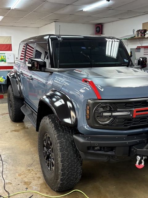 gray bronco in bay