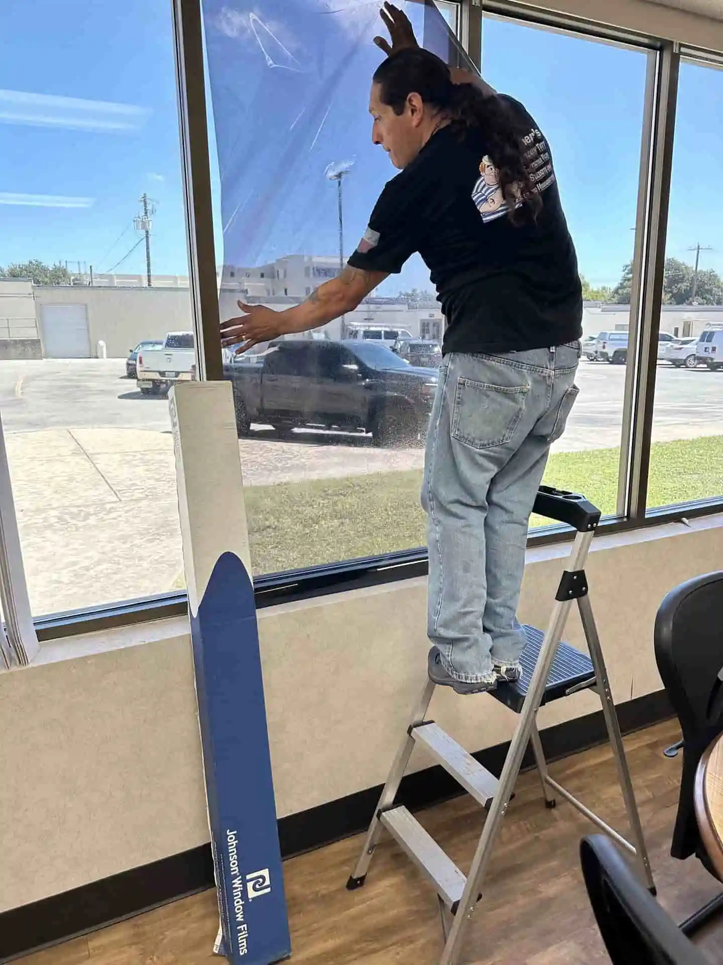 office film on ladder