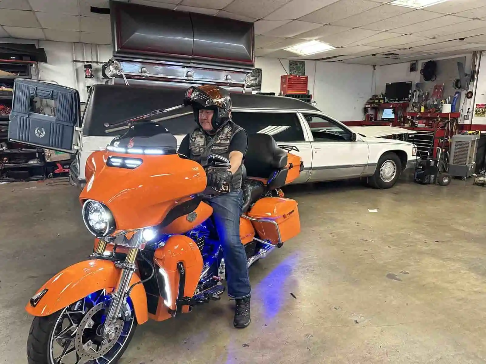 orange harley in bay