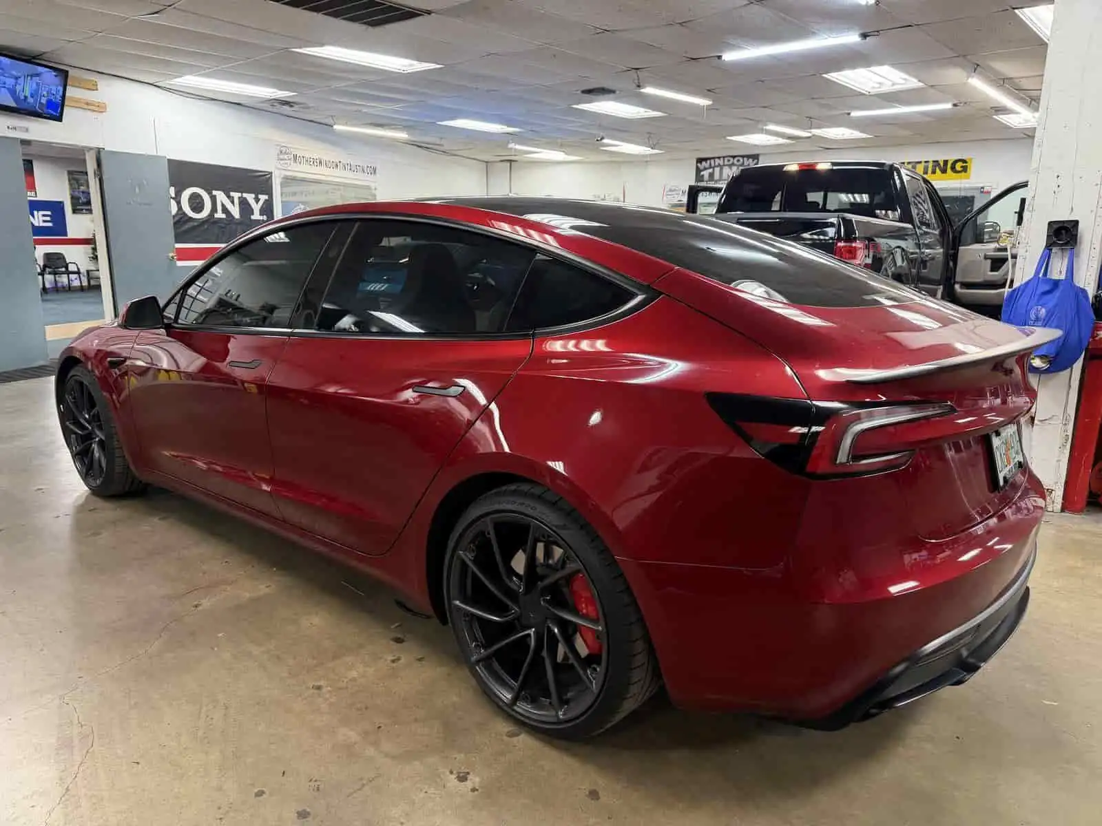 red tesla in bay