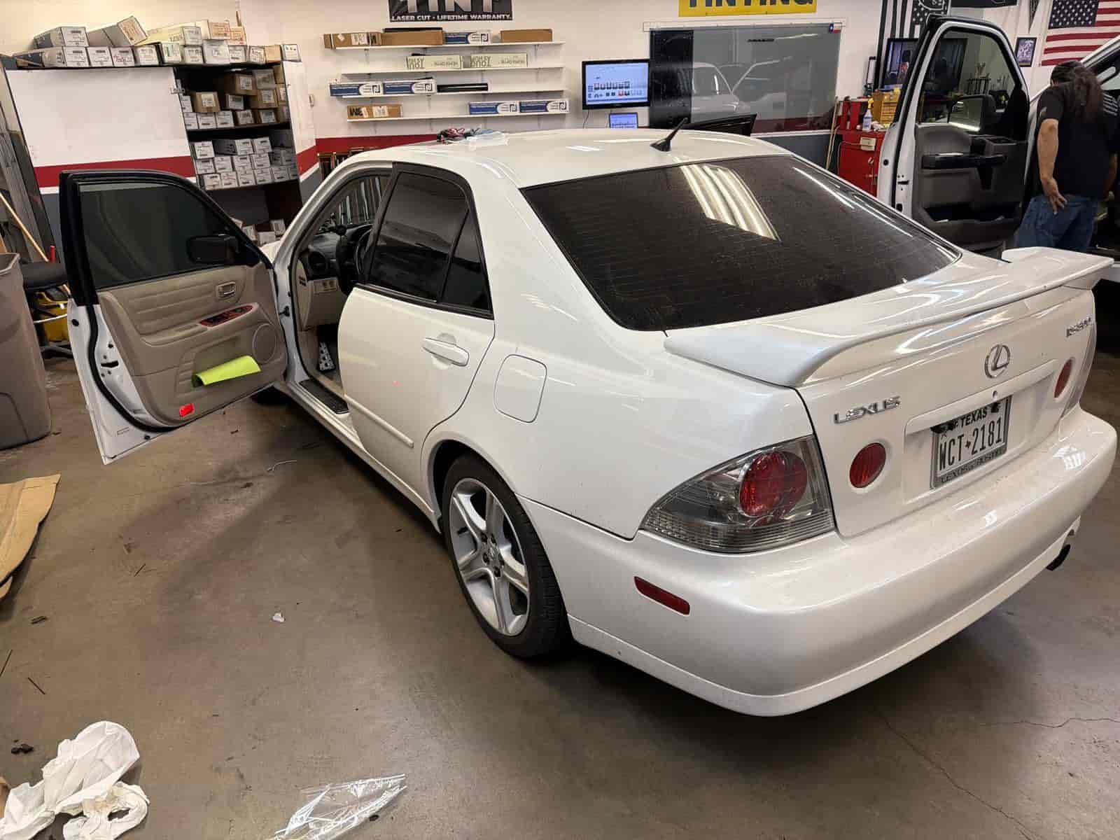 white lexus in bay