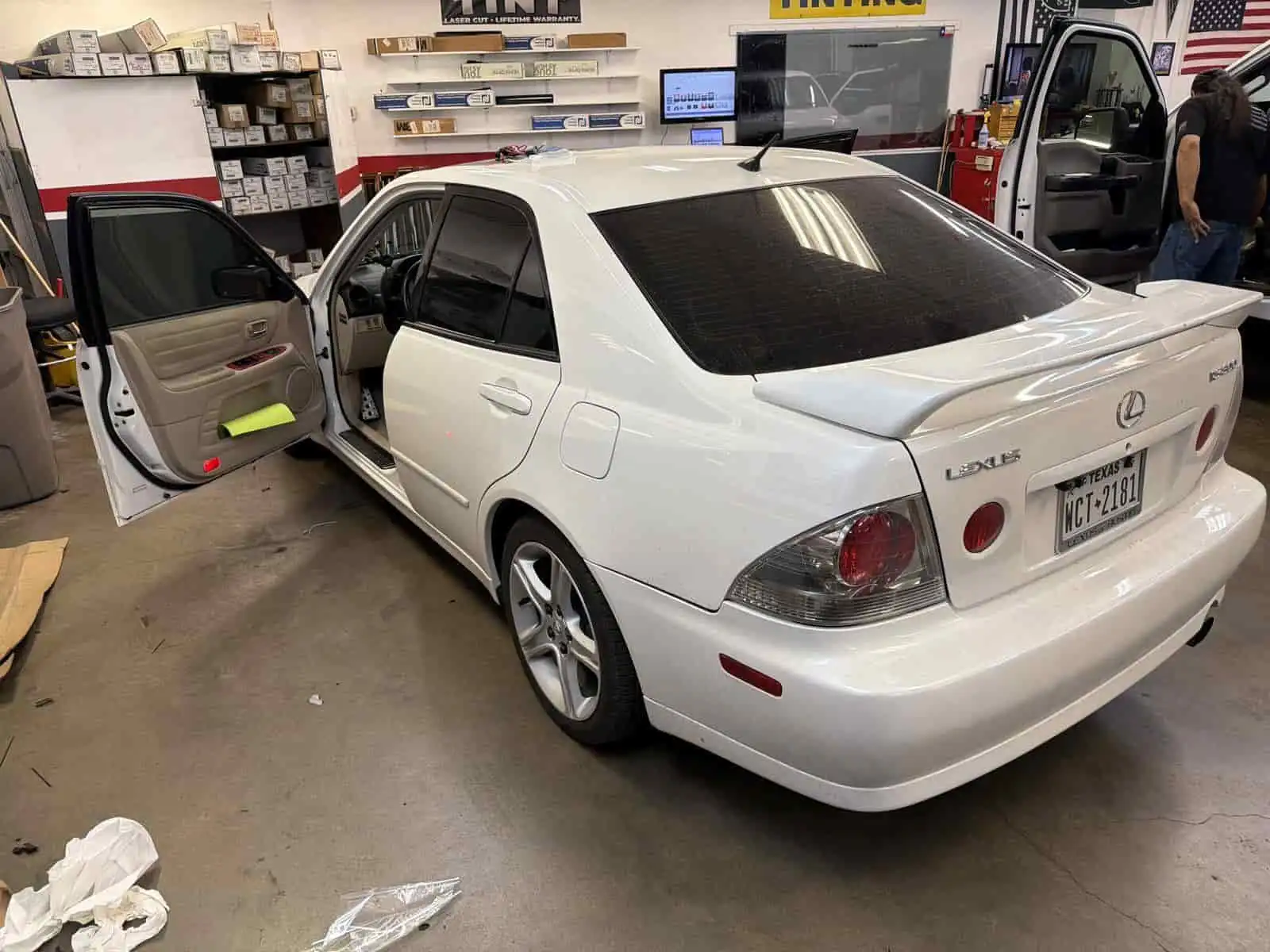 white lexus in bay