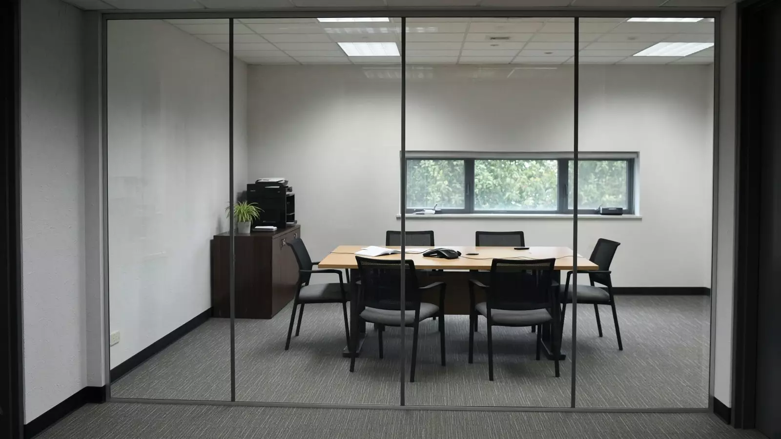 Looking through clear glass into a boardroom